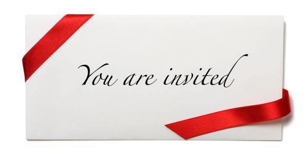 Elegant invitation card with red ribbon and cursive text.