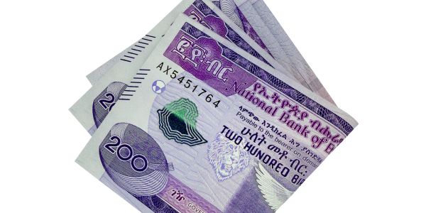 Three 200 Ethiopian Birr banknotes fanned out on a white background.