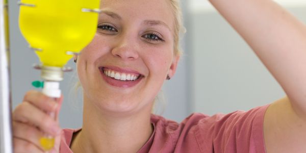 Infusion nurse administering specialty drug