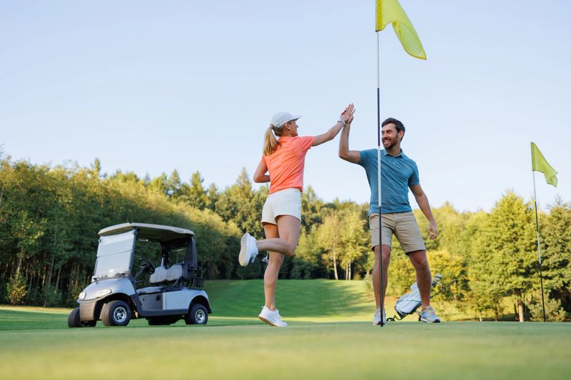 The Winning Moment: Couple Celebrates Golf Victory