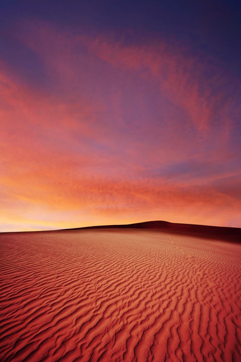 rippled desert sand dunes at sunset, vertical frame (XL)