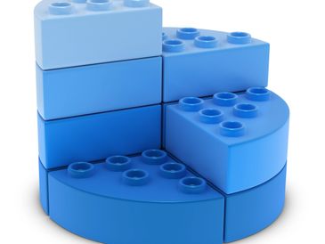 Stacked blue LEGO bricks forming a semi-circular shape.