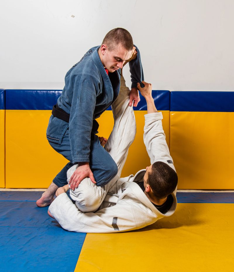 Brazilian jiu-jitsu and grappling training for men in a self-defense gym