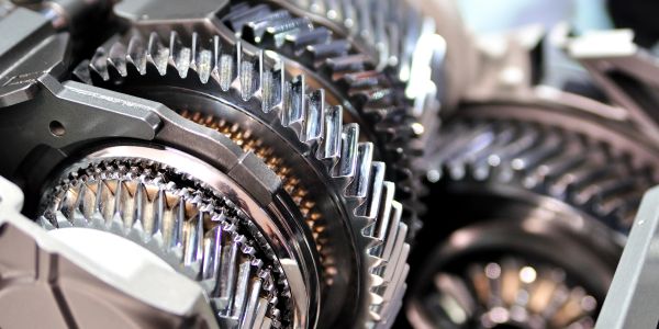 Close-up of shiny metal gears.