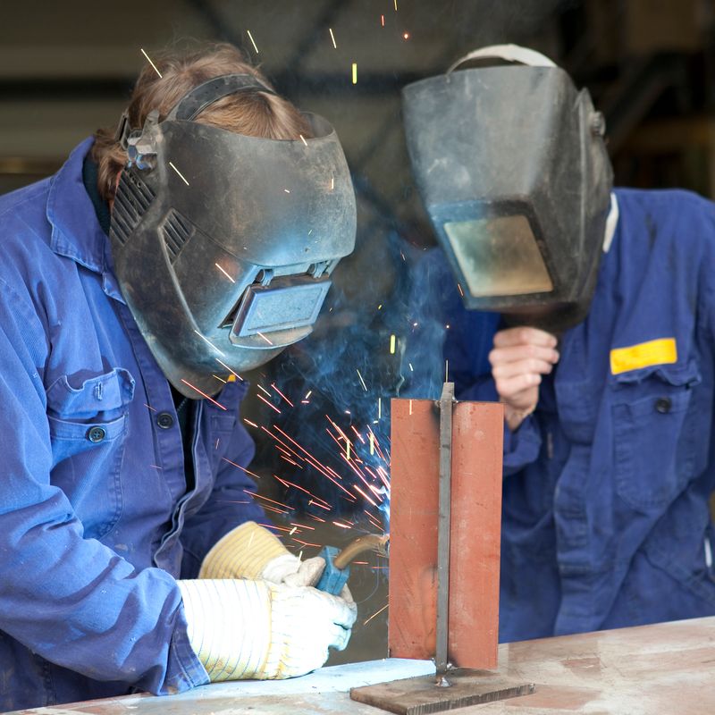 Welder with young female apprentice.If you want more images with a trainee please click here.