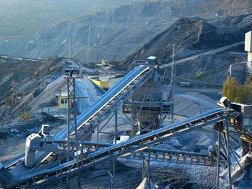 Industrial conveyor belts in a mining quarry.