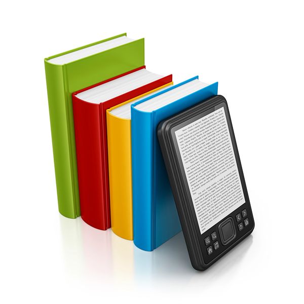 Colorful hardcover books and a black e-reader displaying text.