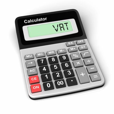 A calculator displaying 'VAT' on its screen.