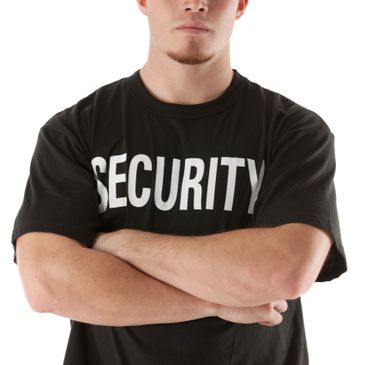 Man wearing a black security t-shirt with arms crossed.