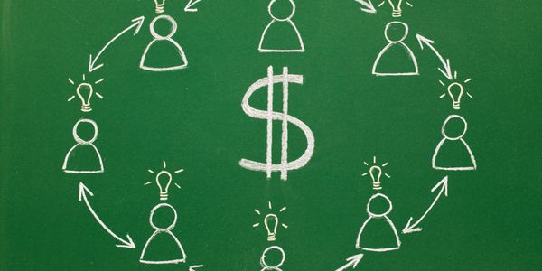 Chalk drawing of people exchanging ideas around a dollar sign on a green board.