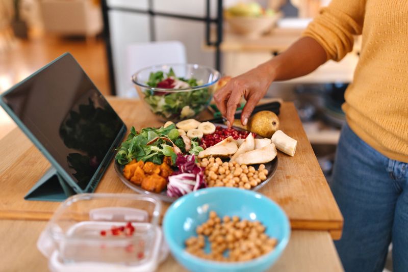 Modern family preparing healthy meal in the kitchen