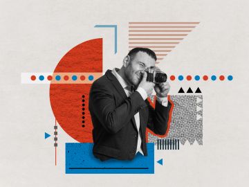 Man in a suit taking a photo with a camera, surrounded by abstract geometric shapes.