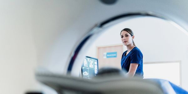 Healthcare professional reviewing health data