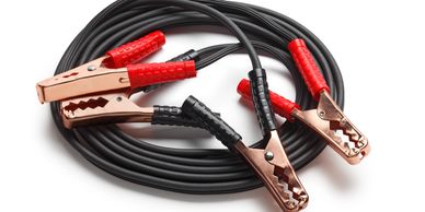 A Black Color Wire Coil With Controls To Battery