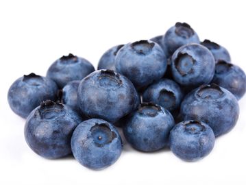 Close-up of fresh blueberries on a white background.