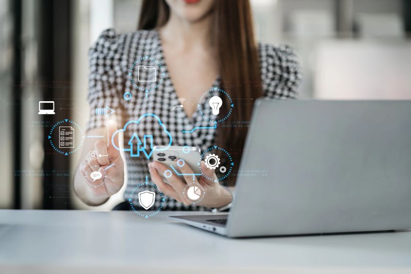 Woman is using a smartphone and tablet to access the cloud computing system , Storage and data transfer Cloud network , Cloud technology. Networking and internet service concept.