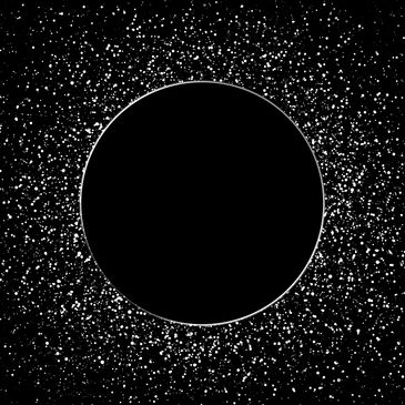 Black circle surrounded by white speckles resembling stars in space.