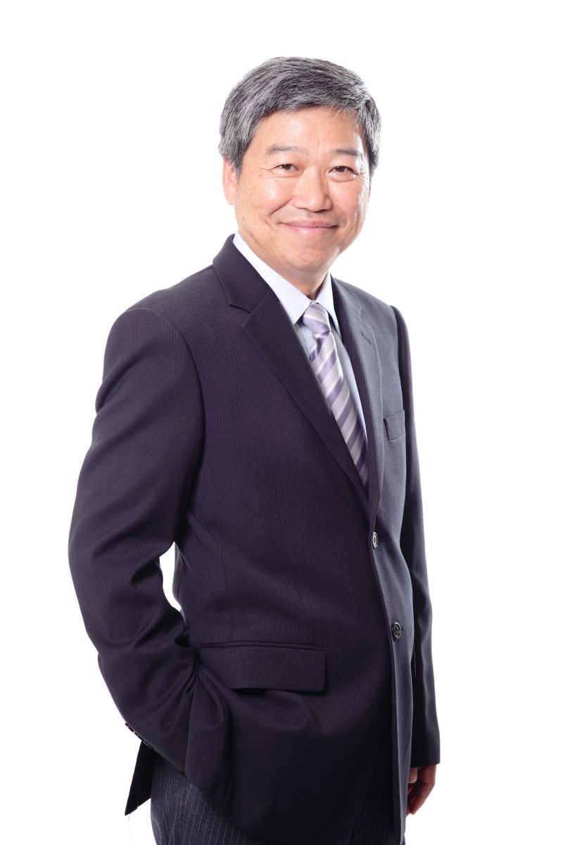 Portrait of smiling senior business man isolated on white background, asian people