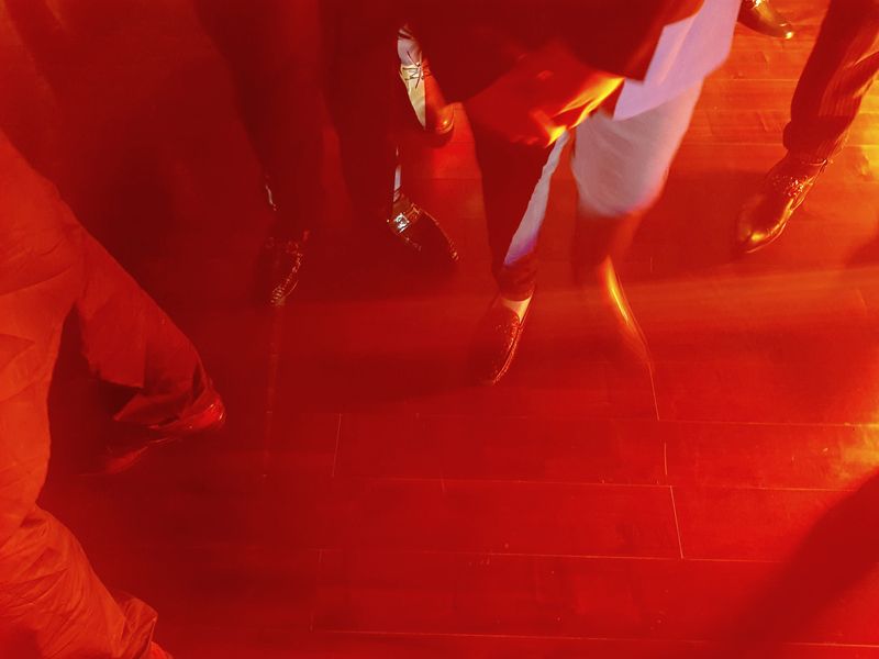 Low section of people on floor.