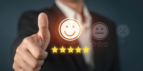 Thumbs up with a five-star smiley rating.