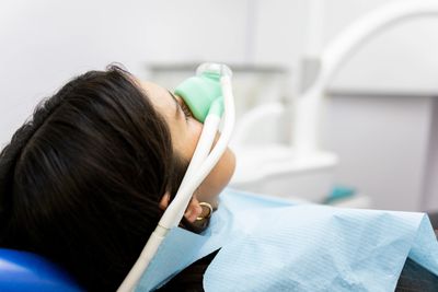 Patient relaxing in dental chair with nitrous oxide sedation at Save Dental in Orem, Utah.