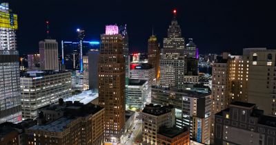 City skyline illuminated at night.