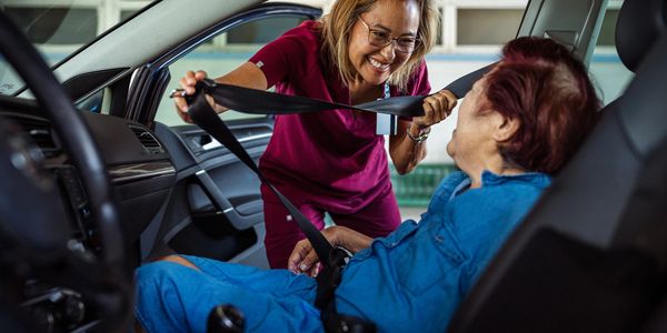 Caregiver assisting client to run errands