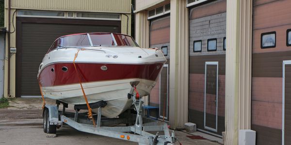 Recreational powerboat on trailer ready for boat and trailer service