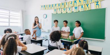 Kids presenting a project in a classroom.