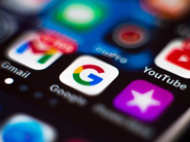 Close-up of smartphone screen showing Gmail, Google, and YouTube app icons.