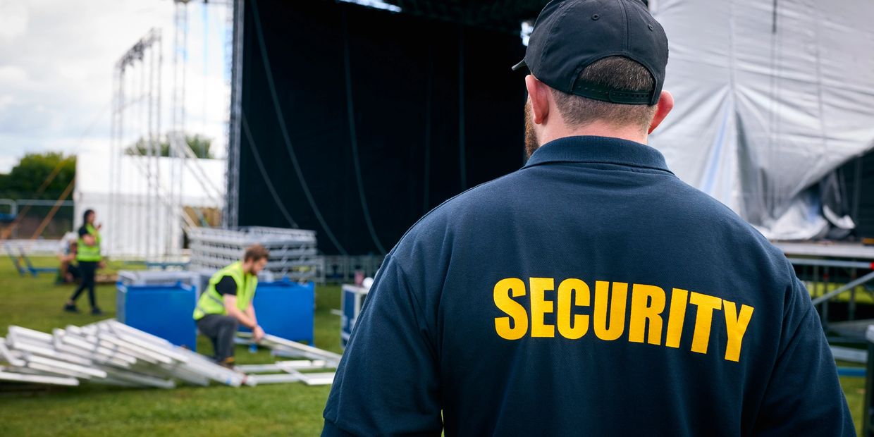 security team managing a large crowd at an event