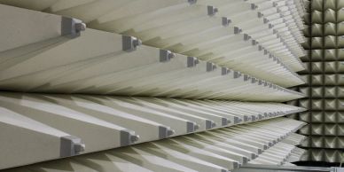 Empty anechoic chamber with wedge-shaped foam panels.