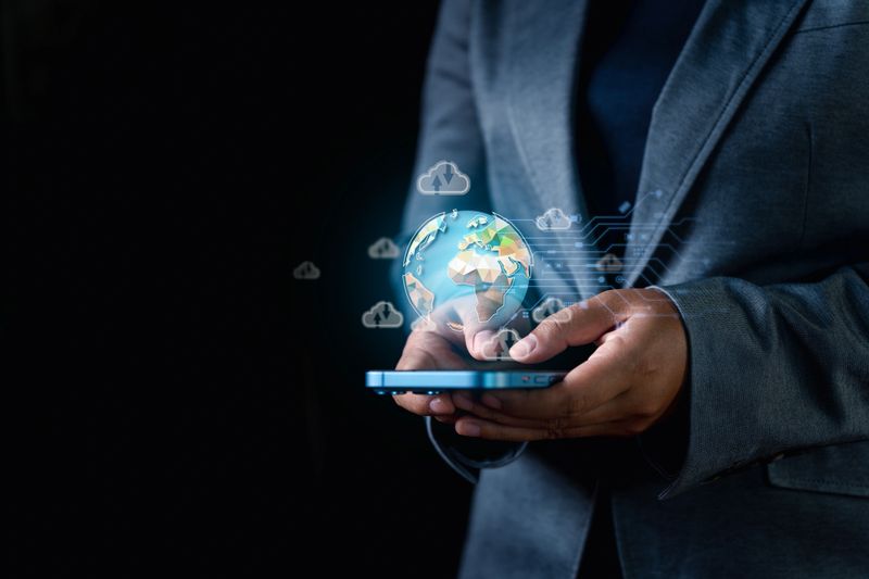 Business woman's smartphone showcases virtual screen for seamless cloud data connection, mass storage, and efficient data management