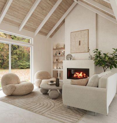 Cozy modern living room with fireplace and neutral tones.