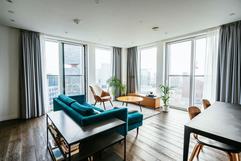 Modern apartment with large windows in contemporary skyscraper