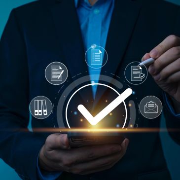 Businessman with digital task management checkmark.