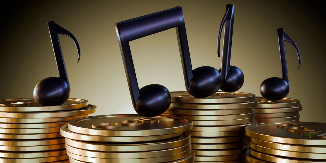 Black musical notes on stacks of gold coins.