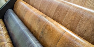 Vinyl samples on a roll in wood 