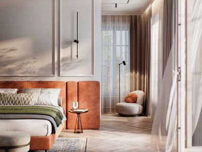 Cozy bedroom with warm tones and modern design.