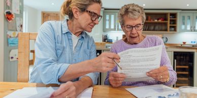 Women interacting in a cozy room.