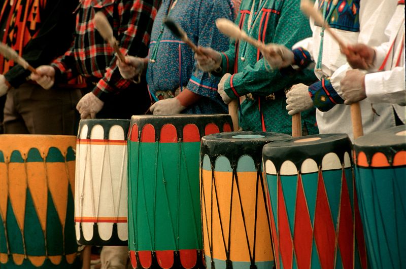 Native American drummers from a New Mexico Pueblo are participating in celebrations of music and dance. A long tradition of their ancestors. You can feel the rhythm of the drums.