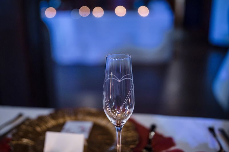 Champagne glass with a heart etched on it for a wedding reception