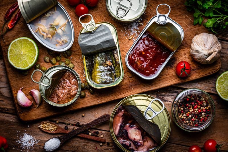 Premium canned mackerel and sardines displayed elegantly for international buyers.