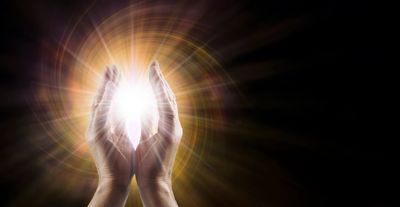 Reiki Energy healing coming from hands 