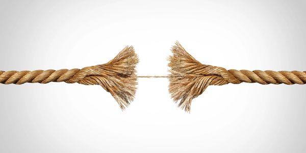 A frayed rope about to break, symbolizing tension or stress.