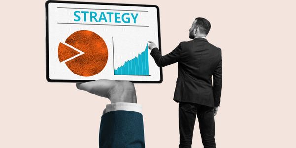 Businessman analyzing a strategy chart held by a hand emerging from a hole.