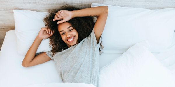 Lady refreshed after quality sleep