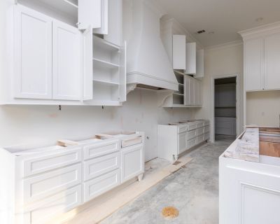 Wooden dining furniture in a cozy kitchen and dining area.
