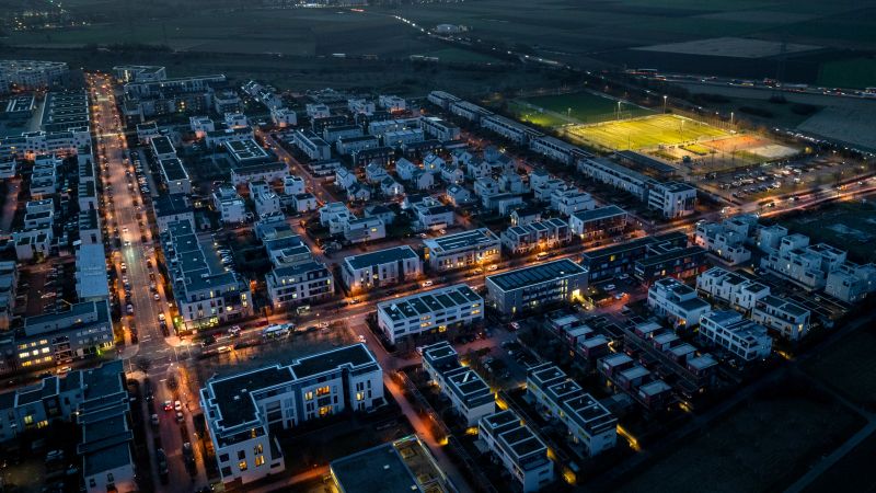 Aerial view over Frankfurt Riedberg and Mertonviertel at dusk. Frankfurt-Riedberg is a newly developed city district in the north of Frankfurt, Germany.