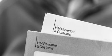 HM Revenue &amp; Customs envelopes in black and white.